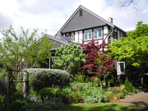 Landscape Design & Arts & Crafts Architecture Melbourne | designing with foliage colours & textures. The plantings marry with the Arts & Crafts revival design of the house.